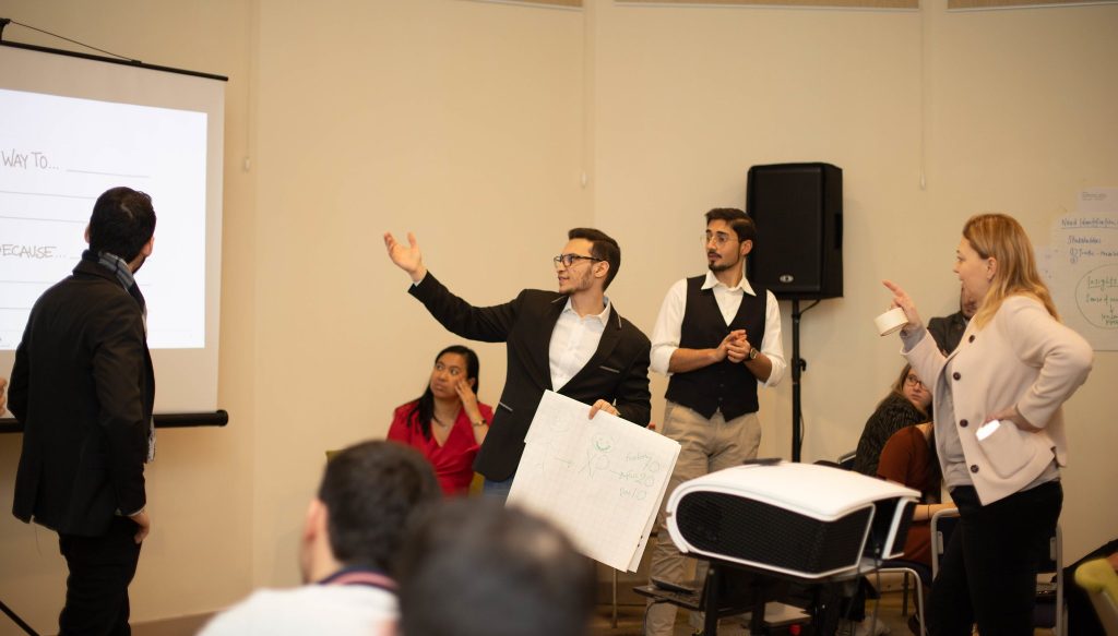 People holding a presentation about the future of work